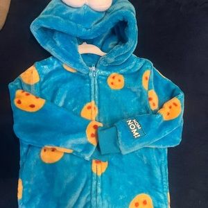 Cookie Monster micro-fleece hoodie with soft fabric and fun eyes on top of hood